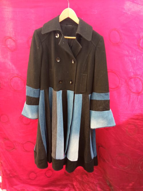 Jeans and Black coat.